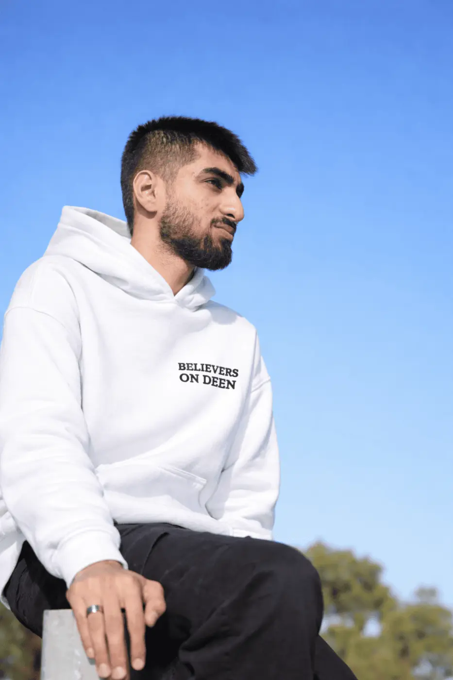 United Ummah Hoodie in white — worn